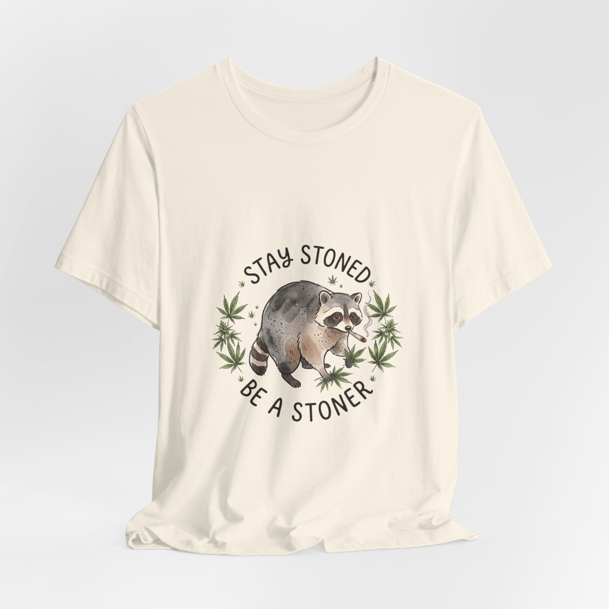 Stay Stoned Raccoon Tee | Jimothy-style scruffy raccoon, weed leaf illustration